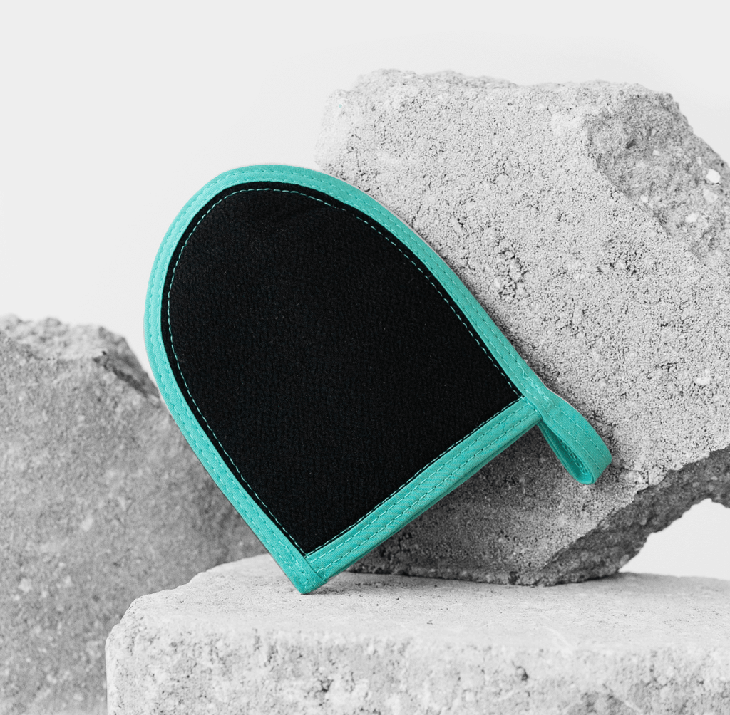 Exfoliating face mitt from Dermasuri for achieving a smoother and clearer complexion.