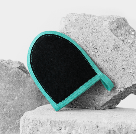 Exfoliating face mitt from Dermasuri for achieving a smoother and clearer complexion.